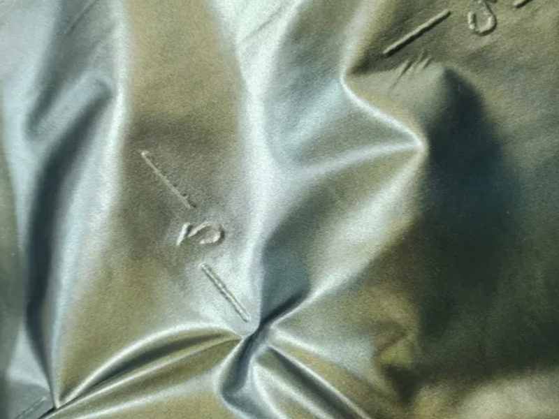 Tissu de veste en duvet de polyester imperméable populaire à l'épreuve du duvet 4 couches